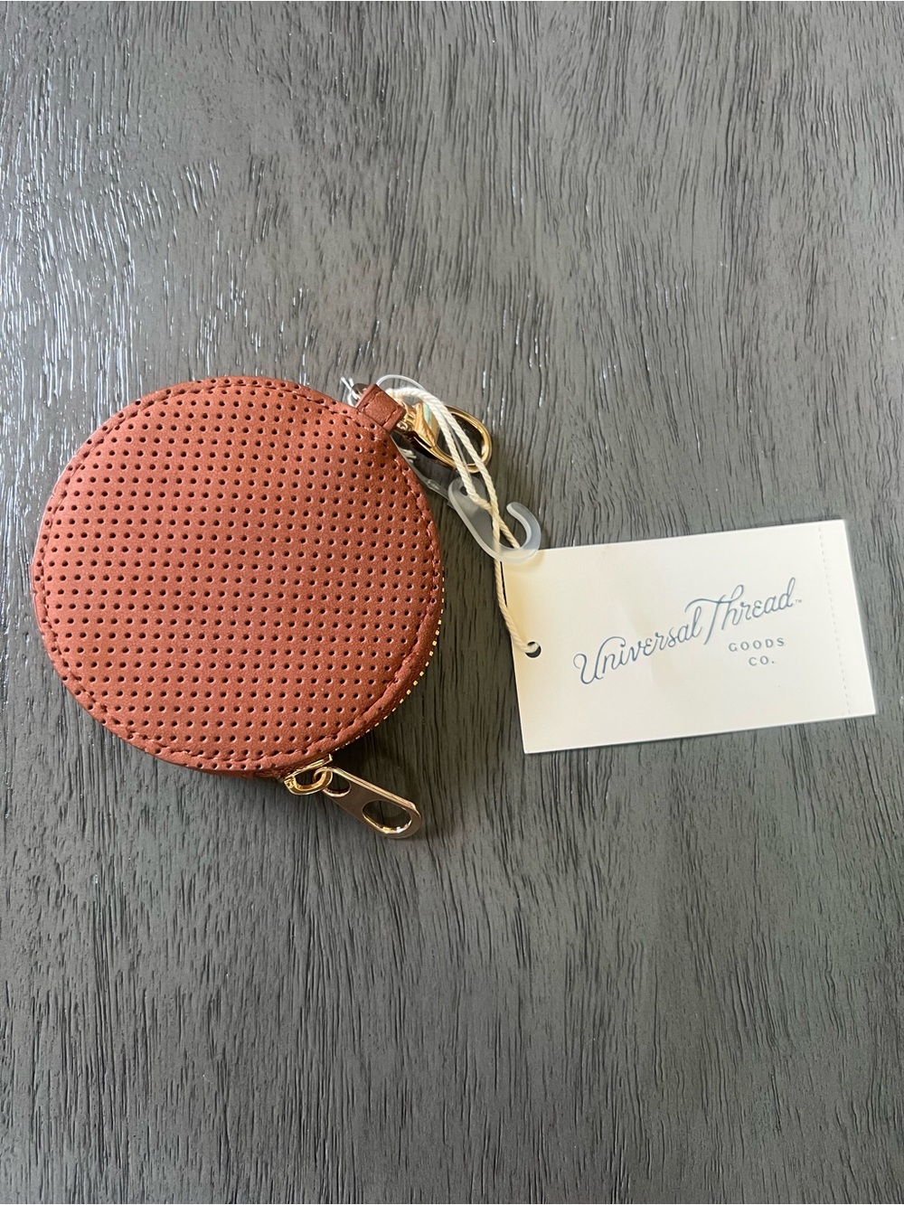 Universal Thread Round Perforated Coin Pouch in Rust Brown